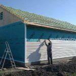 наружная отделка дома из СИП панелей