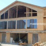 Двухэтажный каркасный дом под отделку